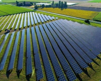 Ground-mounted solar photovoltaic panels generating renewable electricity