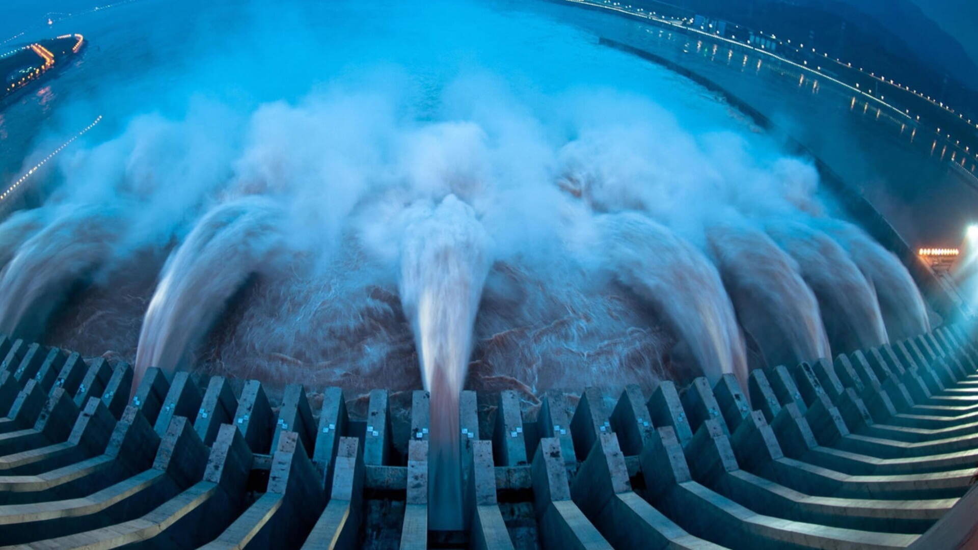 Hydropower station releasing water through turbines to generate renewable electricity